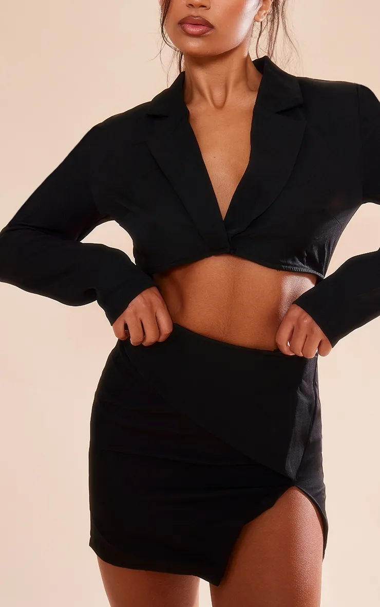 Robe blazer noire découpée à jupe portefeuille